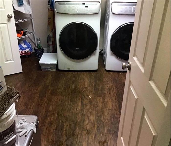 washer and dryer leaks onto floor