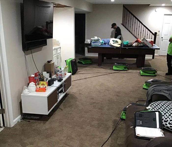 air movers on floor in home