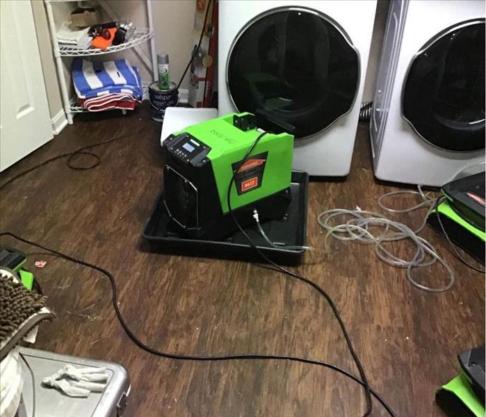 air movers in front of washer and dryer